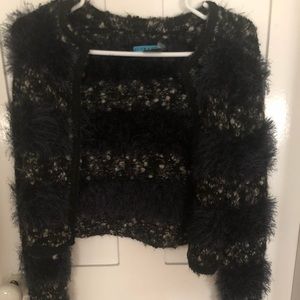 Alice and Olivia shrug